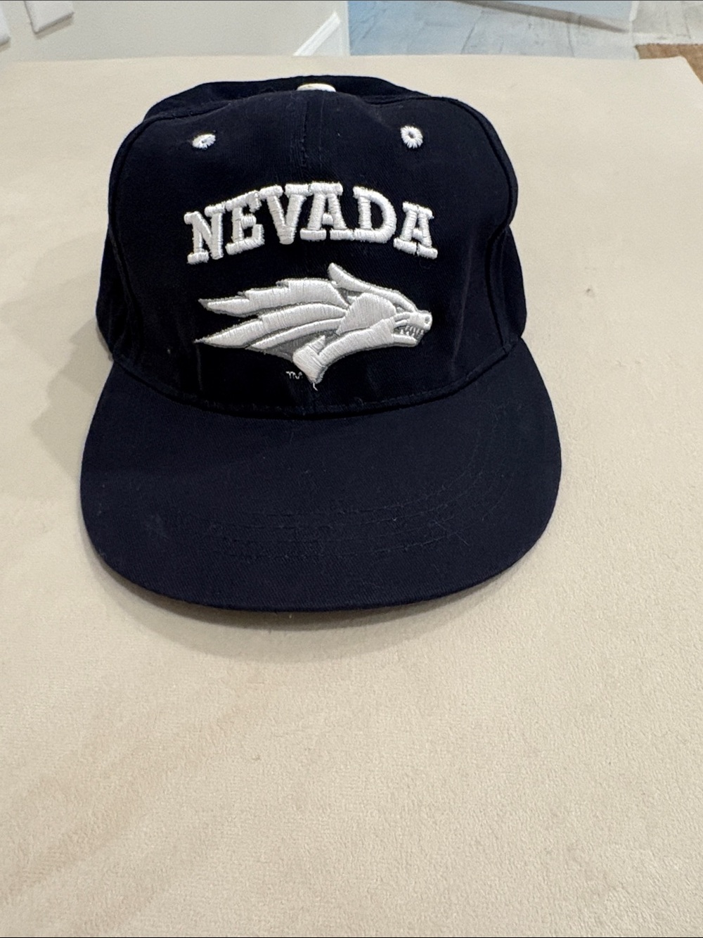 Nevada Navy Embroidered College Logo Baseball Cap